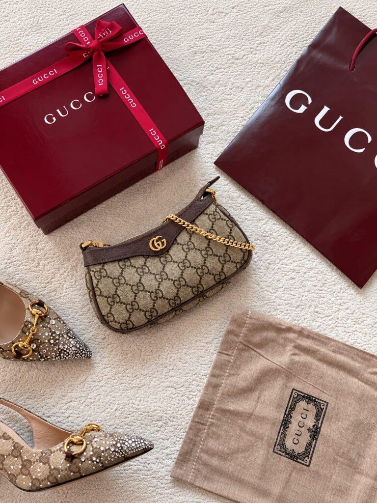 Mini monogram-canvas shoulder bag with leather trim and a gold chain