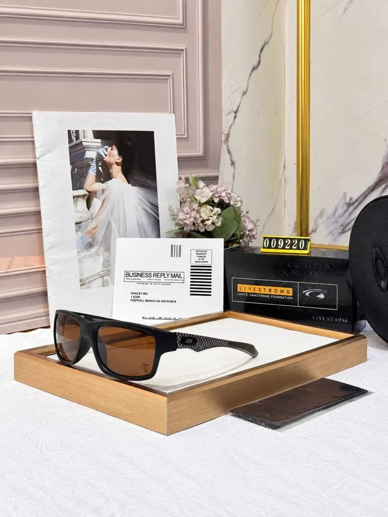 Sport sunglasses with a matte black frame and brown lenses